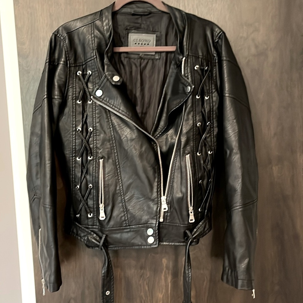 Beautiful worn in faux leather jacket